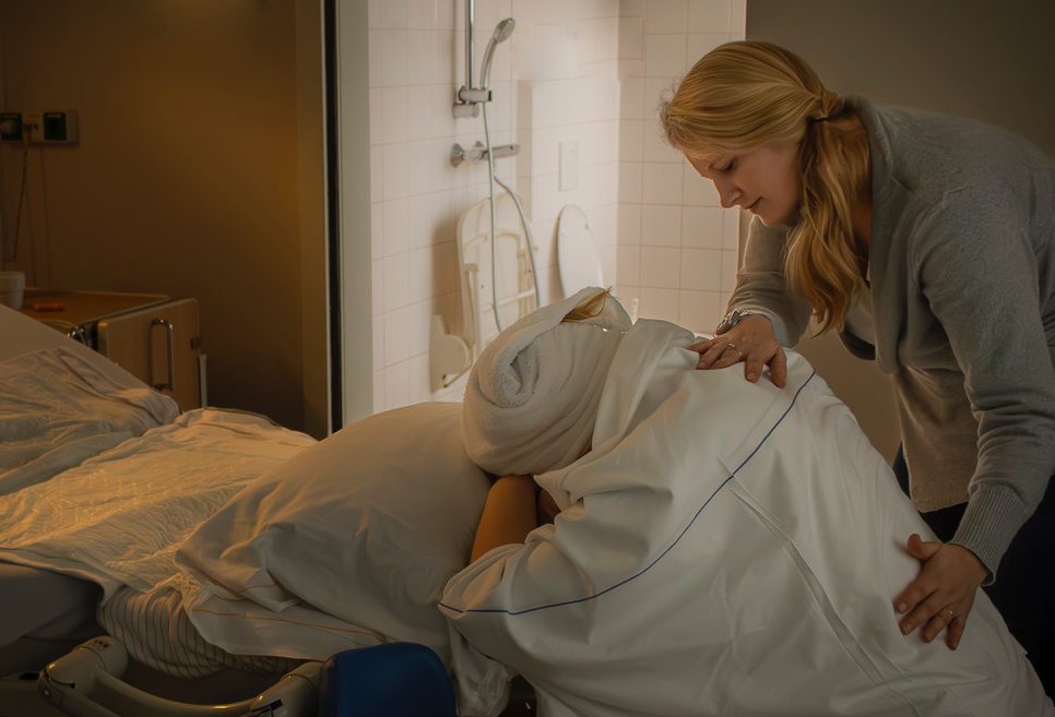 Doula aan het werk